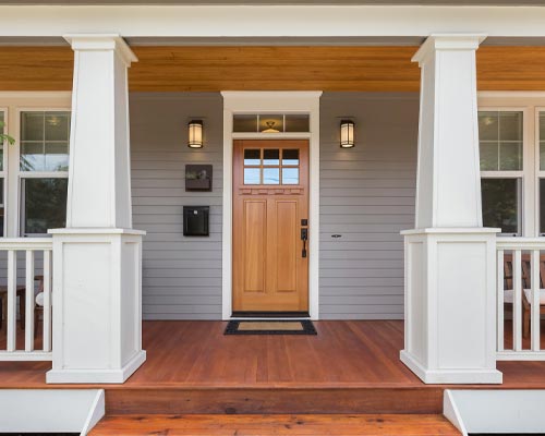 Entry door - light brown wood