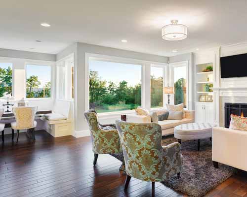 Large windows with no inside panels in living room